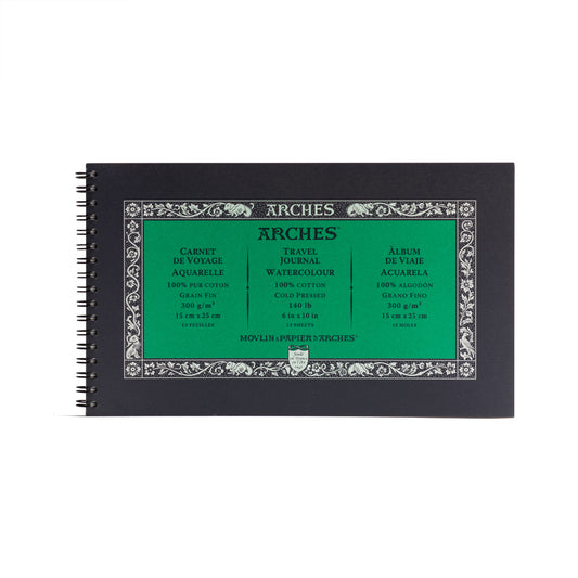 A landscape Arches watercolour travel journal spiral bound on the short edge with 15 sheets of cold pressed 300 gsm paper. 15 by 25 centimeters in size.