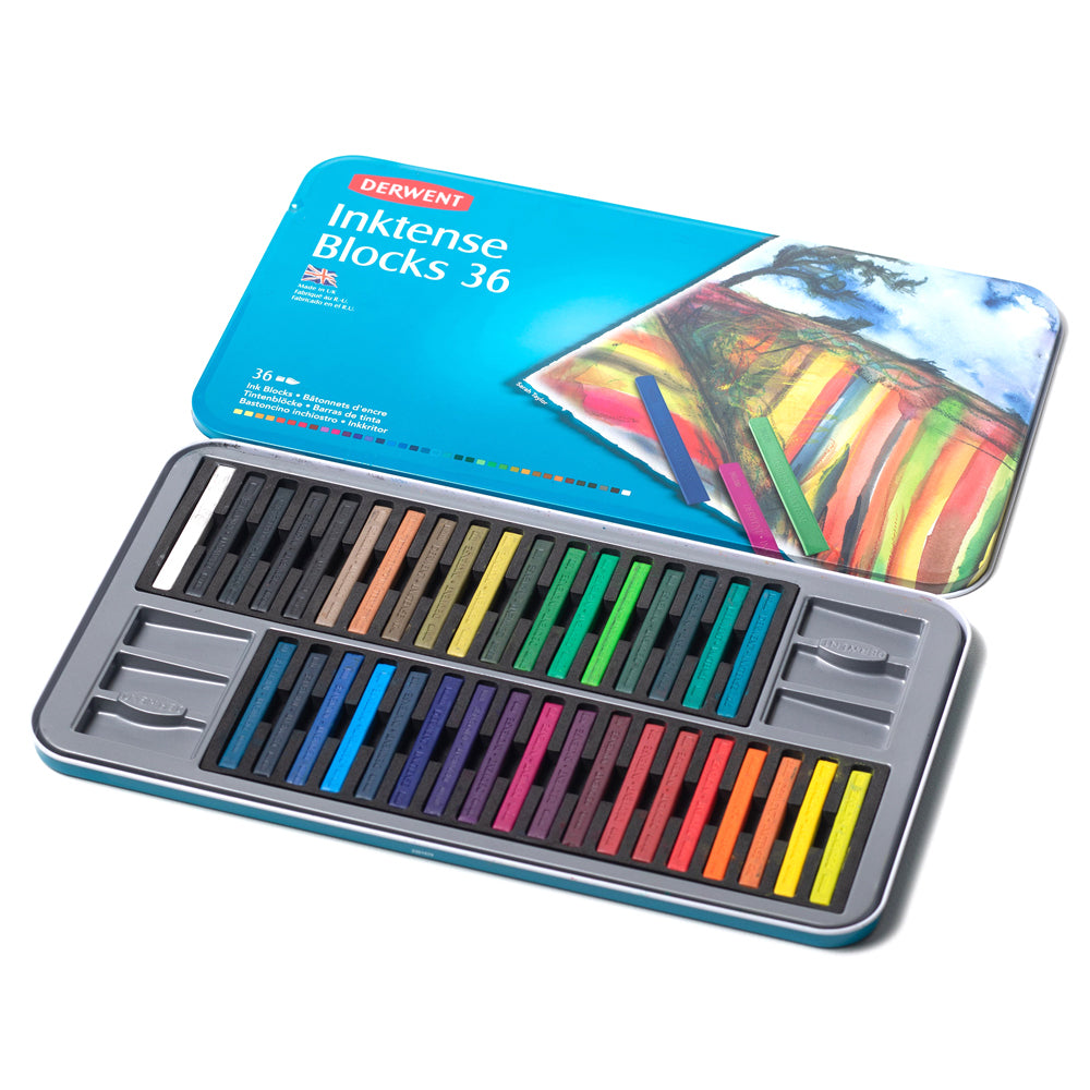 An open tin set containing 36 colours of square cut Derwent Inktense blocks.