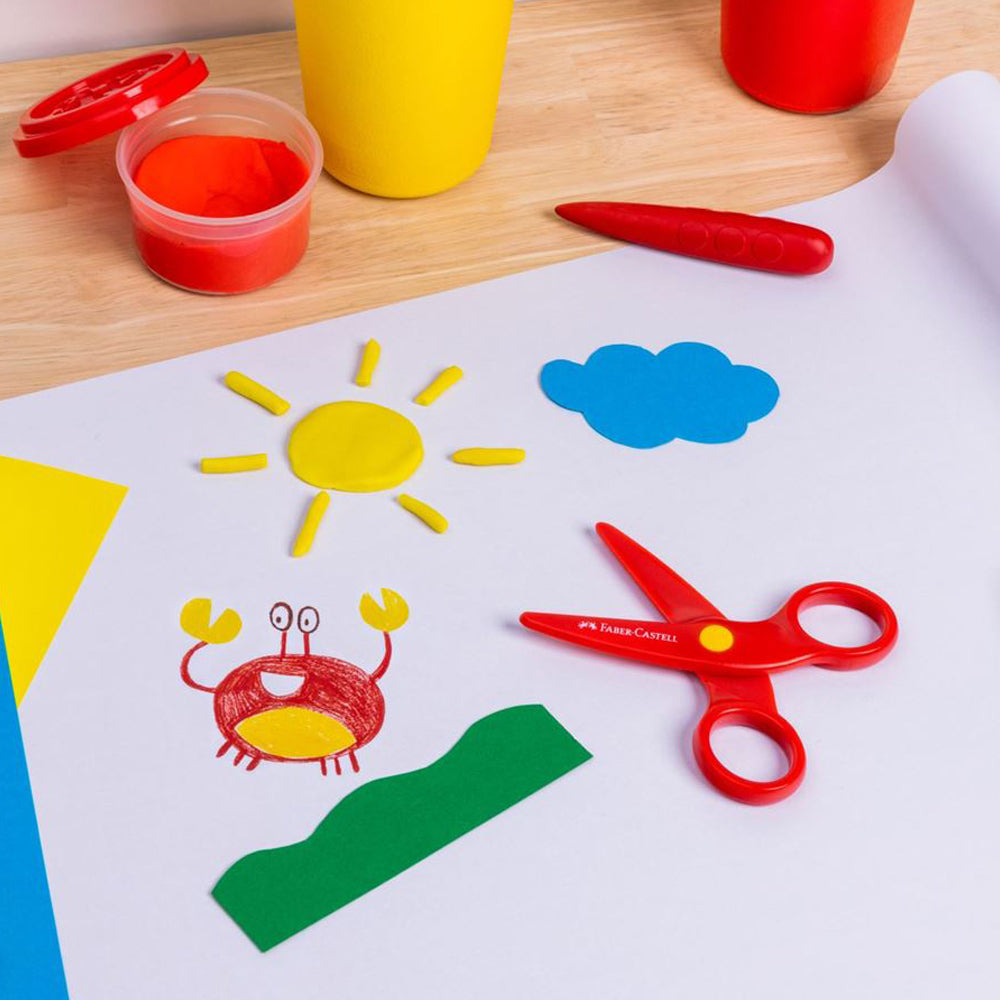 Shapes of paper cut using Faber-Castell playsafe scissors.