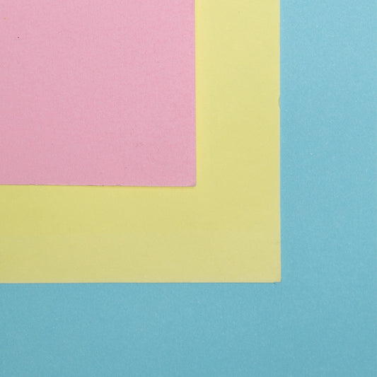 Sheets of Favini Prisma paper in multiple colours.