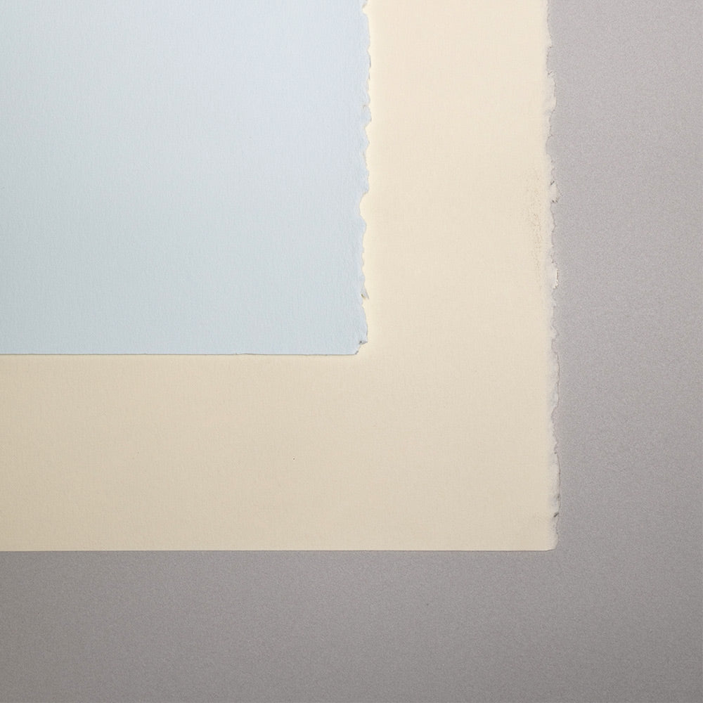 Sheets of Legion Stonehenge paper in multiple colours. The edges are deckled on one edge and clean cut on the other.