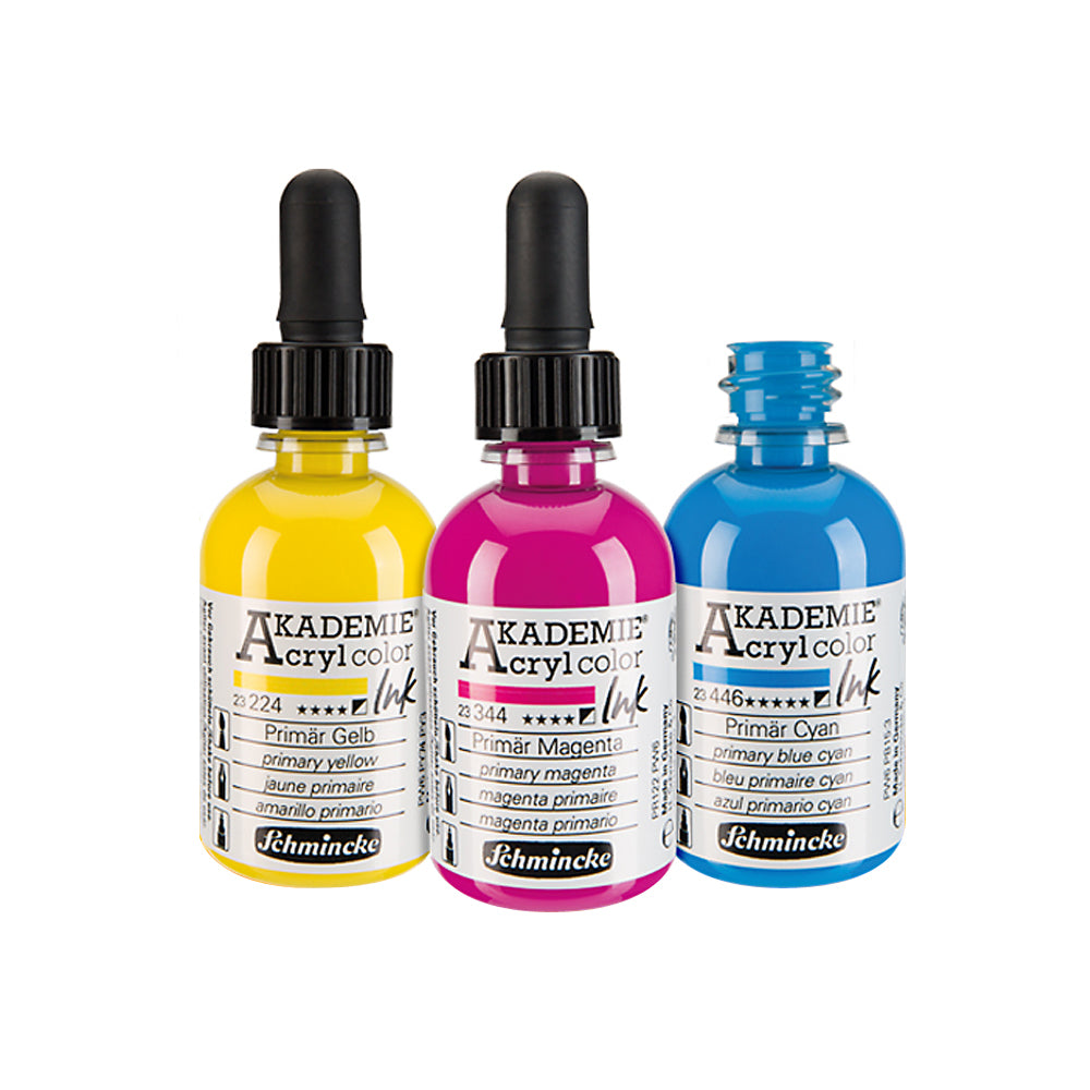 Bottles of Akademie acryl color ink with glass dropper lids.