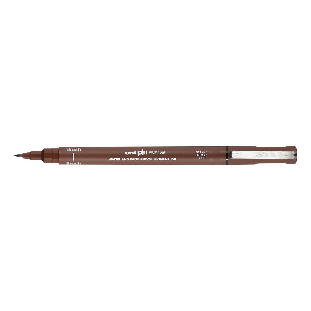 A sepia, brush tip Uni Pin fine line pen with clip lid.