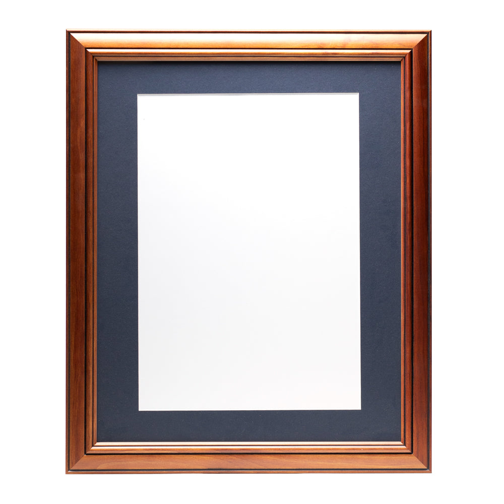 A wooden frame with walnut stain finish, bevelled edges and a dark blue pre-cut framing matt.
