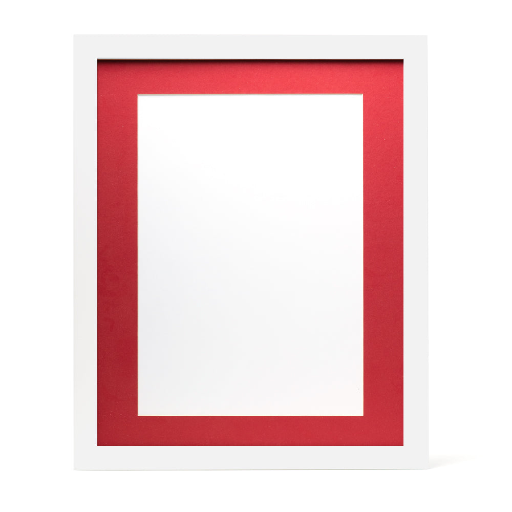 A white wooden frame with a bright red pre-cut framing matt.