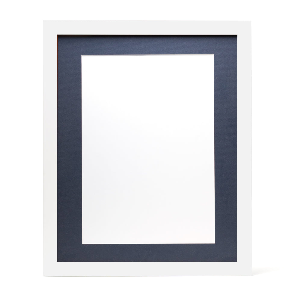 A white wooden frame with a dark blue pre-cut framing matt.