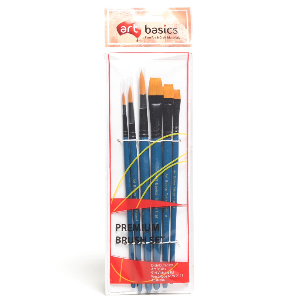 A packet of six assorted brushes on short wooden blue handles. Packet contains one number 4 round brush, one number 4 flat  brush, one number 8 round  brush, one number 8 flat  brush, one number 12 round  brush and one number 12 flat brush