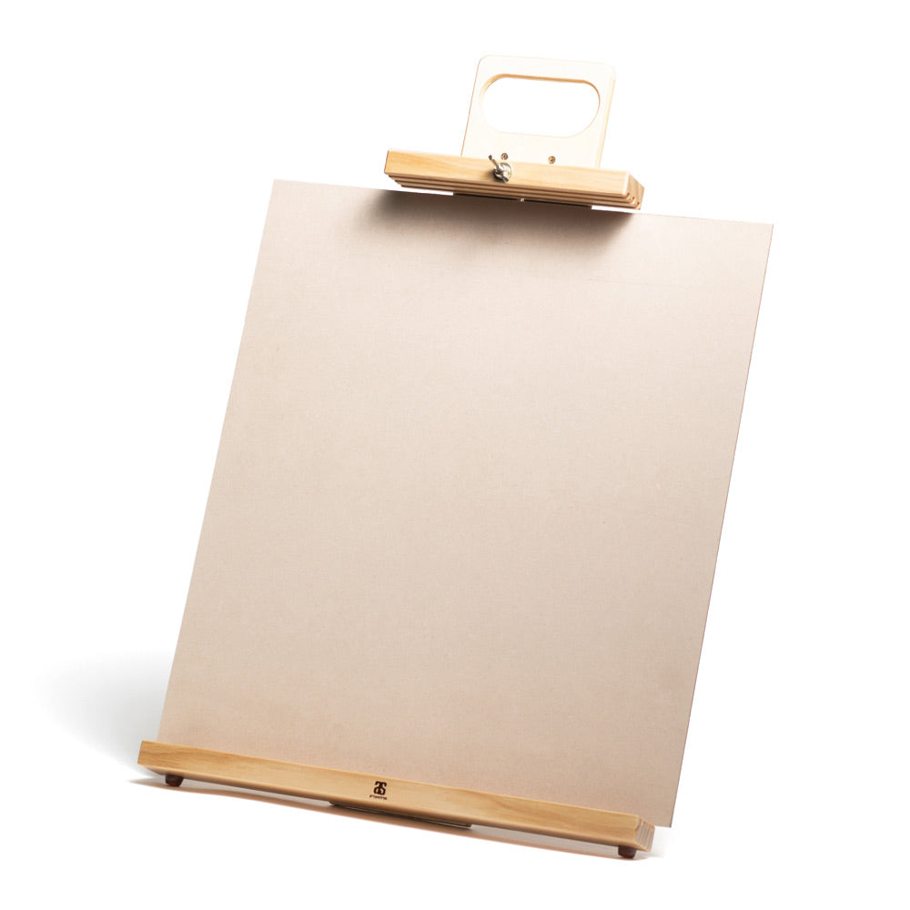 A wooden table easel with MDF backing board. The easel features a cut out handle and an adjustable sliding top bar fixed with a wing nut. Three slots in the top and bottom bars allow for three paint boards to be carried at one time.