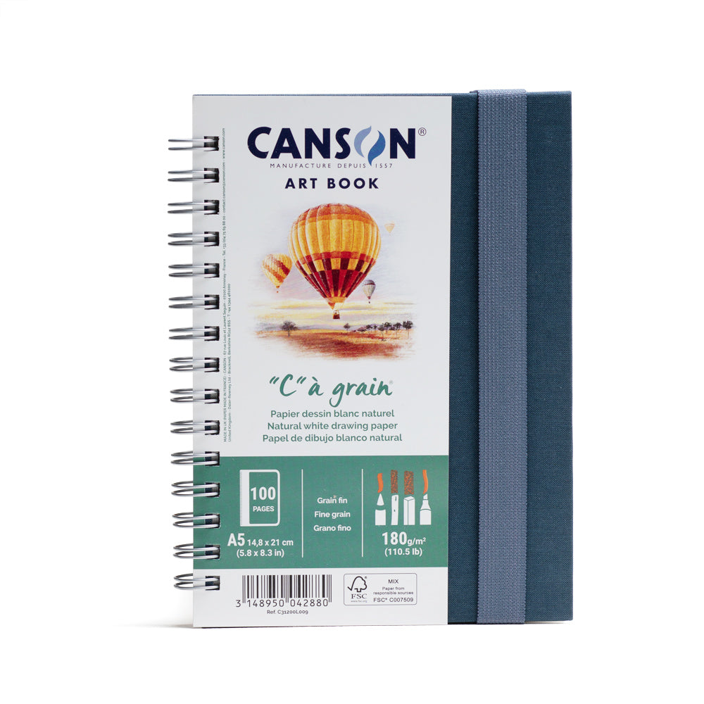 Canson C à grain art book, spiral bound on the long edge with an elastic closure. This book contains 100 pages of 180 gsm fine grain paper. 14.8 by 21 centimetres in size.