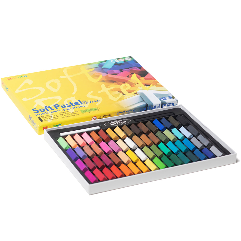An open set of 64 square, half length square Mungyo soft pastels in assorted colours as well as one white and one black full length hard pastel held in a cardboard case.
