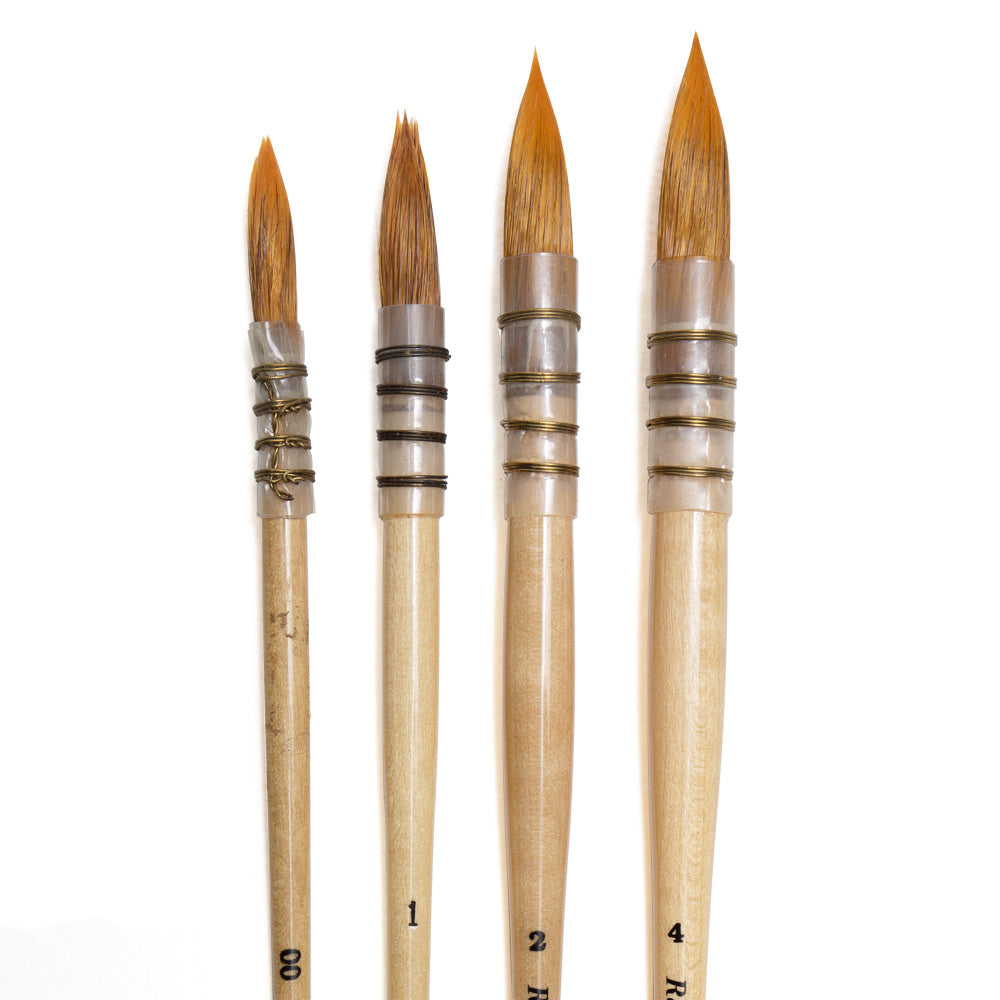 Rekab Sable Ester Mix Round brushes in sizes double 0, 1, 2 and 4 with rounded bristles that come to pointed tips.