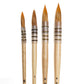 Rekab Sable Ester Mix Round brushes in sizes double 0, 1, 2 and 4 with rounded bristles that come to pointed tips.