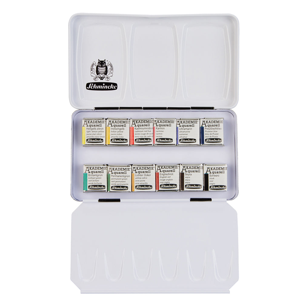 An open tin with hinged lid containing 12 small pan watercolour blocks.